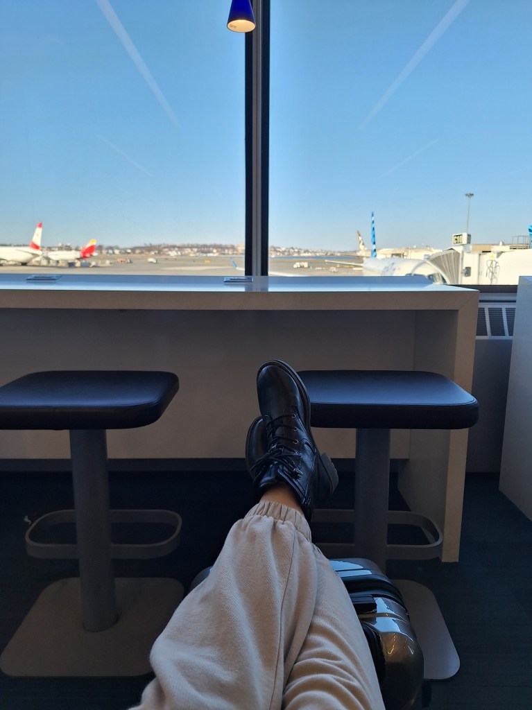 crossed legs in an airplane